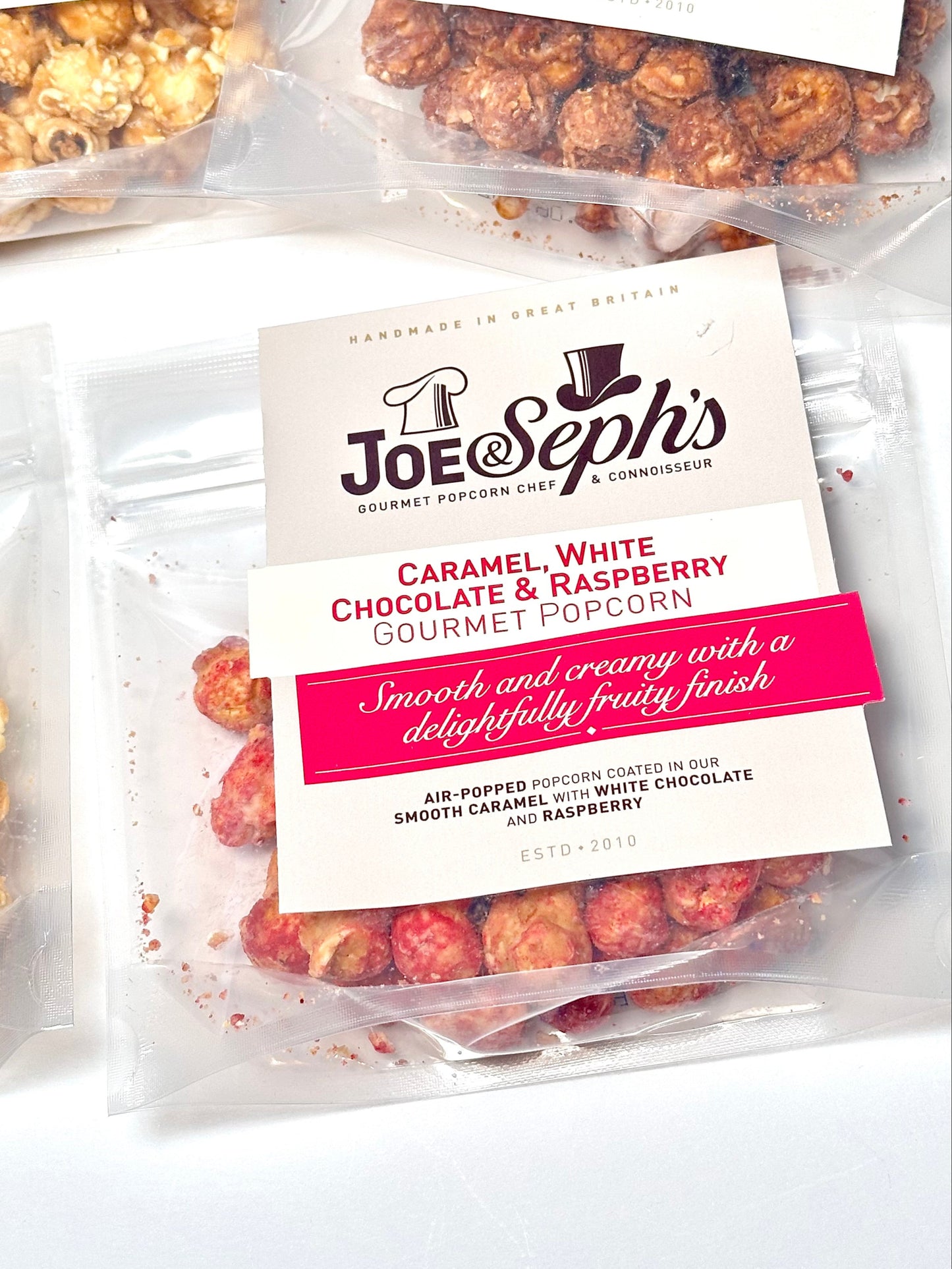 Joe & Sephs Caramel, Raspberry & White Chocolate Coated Popcorn 30g